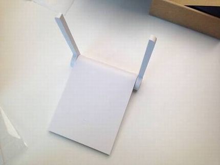 小米路由器mini版真机图评测:神似苹果触控板