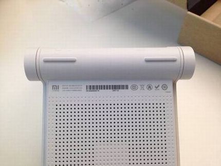 小米路由器mini版真机图评测:神似苹果触控板